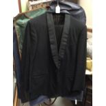 Collection of gentleman's dinner suits, tail coats