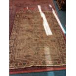 Eastern rug with geometric decoration on red, blue, and beige ground, 188cm x 142, plus another simi