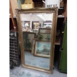 Gilt framed wall mirror in the Victorian style