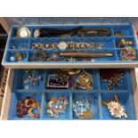 Two jewellery boxes containing vintage costume jewellery, wristwatches and bijouterie