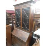 Good quality inlaid mahogany bureau bookcase with shelved interior enclosed by two astragal glazed d
