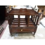 Georgian style mahogany Canterbury with drawer below on turned legs and brass castors, 46cm wide, 35