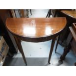 Good quality Edwardian inlaid mahogany card table with fold over top on square taper legs and castor