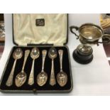 Set six silver Royal Commemorative teaspoons in fitted case and small silver two handled trophy on s