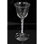 18th century wine glass, ogee bowl with flared rim, opaque twist stem and conical foot, 15.25cm high
