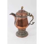 Middle Eastern copper coffee pot with silvered decoration, raised on a pierced base