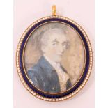 Late 19th / early 20th century portrait miniature on ivory, depicting a gentleman in blue coat, oval