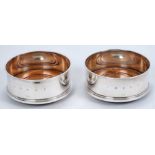 Pair of contemporary silver wine coasters