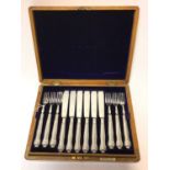 Late Victorian set of 12 pairs of Kings Husk pattern fish knives and forks, in a fitted case