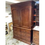 Victorian mahogany linen press, with concave cornice and interior of slides enclosed by pair of arch