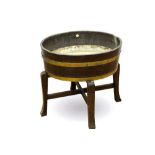 A late 19th / early 20th century brass bound oval wine cooler