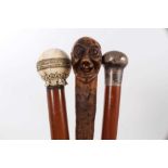 Late 18th / early 19th century ivory knopped Malacca walking stick, together with two further walkin