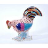 Herend porcelain model of a hen, decorated predominantly in red, marks and model number 5016 to base