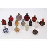 Large collection of Chinese snuff bottles, in hardstone, glass and wood. (15)