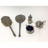 Silver three piece condiment set and a silver backed mirror and brush