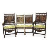 Set of four early 20th century Dutch or Belgian carved oak chairs, each with ornately carved and bob