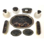 Group of silver and tortoiseshell dressing table items