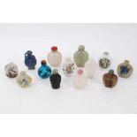 Collection of Chinese snuff bottles, in hardstone and porcelain, the largest 9cm high. (13)