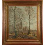 Carl Hansen (1872-1934) oil on canvas - winter woodland with a figure on a track, signed and dated 1