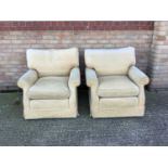Pair of deep upholstered armchairs
