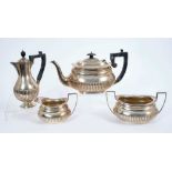Victorian silver three piece tea set and a matching silver hot water jug