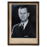 H.R.H The Duke of Edinburgh, signed presentation portrait photograph of the Duke wearing a dark suit
