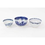 A Liverpool blue and white tea bowl and two Worcester blue and white tea bowls