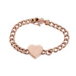 Edwardian rose gold locket bracelet, the heart-shaped plaque concealing a locket compartment, on a c