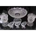 Three Waterford crystal salts, together with a pair of cut glass sweetmeats and a centrepiece