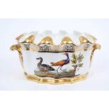 French porcelain two-handled oval Monteith, early 19th century, with gilt rims, handles and scrollin