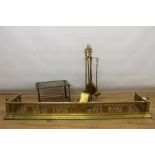 19th century pierced brass fire kerb, together with good quality brass fireside companion set and pi