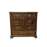 William and Mary walnut and oak chest, in two parts, with four drawers, each with original brass fit