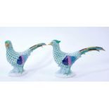 Pair of Herend porcelain models of pheasants, decorated predominantly in green, marks and model numb
