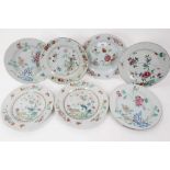 Seven Chinese famille rose dishes, Qianlong period, decorated with flowers, birds and fenced gardens