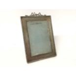 Sterling silver photograph frame, hallmarks for John Collard Vickery, London 1906, with hammered fin