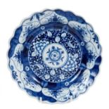 A Worcester plate, painted in blue with the Kangxi Lotus pattern, circa 1770