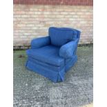 Early 20th century deep armchair by Howard & Co. Ltd, typical form on square feet and brass castors,