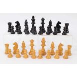 Antique boxwood chess set in stained wooden box