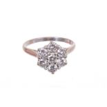 Diamond cluster ring with seven round brilliant cut diamonds