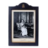 H.M.Queen Elizabeth II, fine signed presentation portrait photograph of The Queen seated in Buckingh