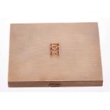 Art Deco 9ct gold cigarette case with calibre cut ruby initials D.M.H. And engine turned decoration,