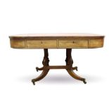 Regency mahogany library table with leather lined top and an arrangement of drawers