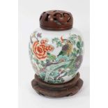 Chinese famille verte porcelain jar, 18th/19th century, decorated with a tropical bird perched on ro