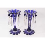 Pair of Bohemian blue flash cut glass lustres with prismatic drops, 26.5cm high