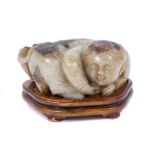 Good Chinese carved mottled jade figural group, 19th century or earlier