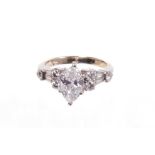 Diamond single stone ring with a marquise cut diamond weighing approximately 0.97cts. together with