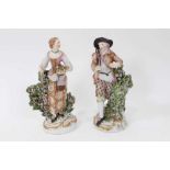 Pair of Derby figures of harvesters, circa 1770, the man shown standing next to a flower-covered tre