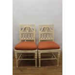 Pair of 19th century Continental, possibly Swedish, white painted salon chairs, each in the Biederme