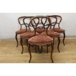 Set of six early Victorian rosewood balloon back dining chairs
