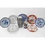 Collection of Oriental porcelain, including two 18th century Chinese armorial dishes, 18th century b